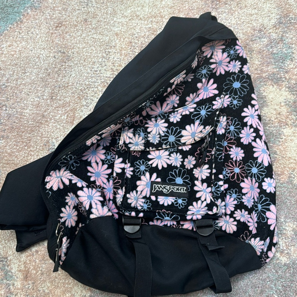 Jansport black floral print side zip backpack